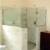 Brushed Nickel Frameless Shower Enclosure using U-Channel and Top/Bottom Pivots w/ a Header Bar